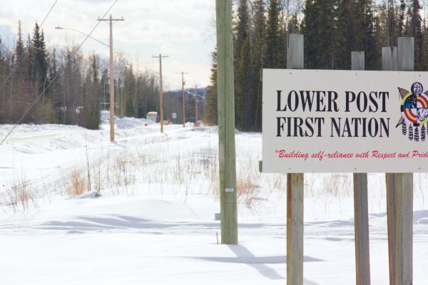 Lower Post First Nation—Building self-reliance with Respect and Pride sign; winter